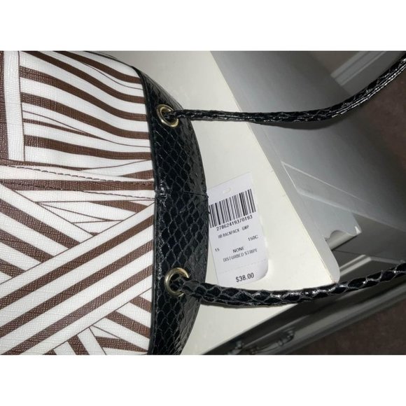Henri Bendel Disturbed stripe Sling bag backpack New with tags